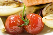 Roasted cherry tomatoes with salmon fillet
