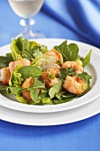 Salad leaves with mustard dressing and shrimps