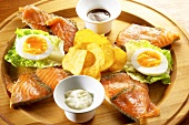Salmon slices with boiled egg