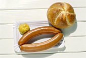 Two Wieners on a Paper Plate with a Dollop of Mustard; Roll