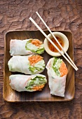 Vietnamese rice paper rolls with dip and chopsticks