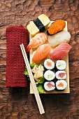Assorted sushi on sushi board