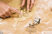Cutting out star-shaped biscuits