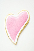 Heart-shaped biscuit with pink icing
