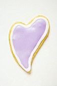 Heart-shaped biscuit with lilac icing
