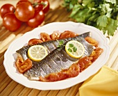 Steamed trout with tomatoes