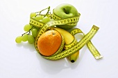 Assorted fruit with a tape measure
