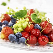 Plate of fresh berries and cherries