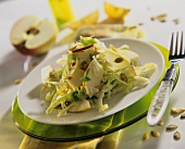 White cabbage and apple salad with pumpkin seeds