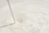 Pouring milk (full-frame)