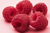 Five raspberries (close-up)