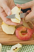 Removing the core from a piece of apple