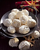 Coconut macaroons on pewter plate
