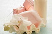 Soap and orchid flower in a shell