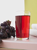 Glass of red grape juice
