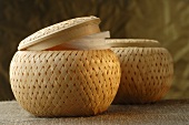 Woven baskets containing cosmetic items