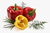 Yellow and red peppers with herbs