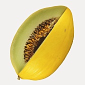 A honeydew melon with a section removed