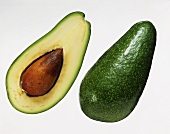 Whole avocado and half an avocado