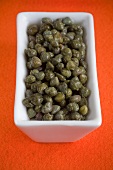 Pickled capers in a small dish