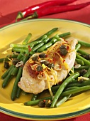 Chicken breast with garlic and chilli on green beans