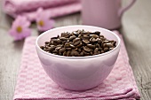 A small bowl of coffee beans