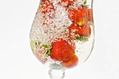 Strawberries in a glass of water