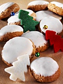 Spiced Silesian biscuits with icing sugar and small felt Christmas trees