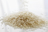 Basmati rice being poured into a heap