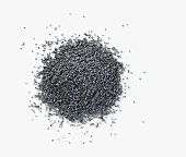 A pile of poppy seeds, seen from above