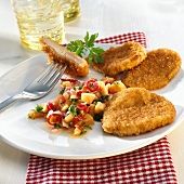 Breaded chicken escalopes with vegetables