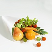 Various types of fruit and vegetables in paper bag