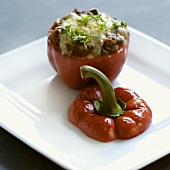 Stuffed baked pepper with cheese topping