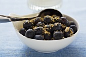 Blueberries sprinkled with cane sugar in a bowl
