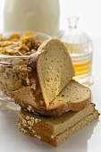 Slices of bread, cereal and honey