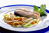 Fried salmon steak and steamed vegetables