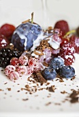Mixed berries with chocolate shavings and milk