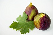 Two figs with leaf