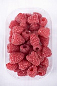 Raspberries in plastic punnet