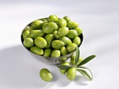 Fresh green olives in a bowl
