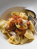 Tortellini with mince sauce and Parmesan