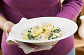 Tortellini with spinach and cream sauce