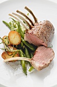 Rack of lamb with green beans and roast potatoes