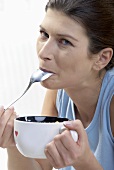 Woman eating muesli
