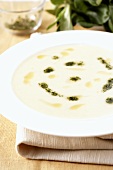 Potato cream soup with pesto