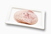 Sliced Bierschinken (ham sausage) on a plate