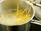 Ribbon pasta in boiling water