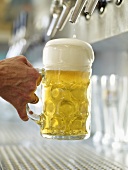 Pouring a litre of draught beer