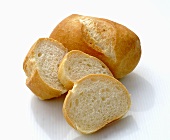 A baguette roll, sliced