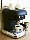 A cup of espresso on espresso machine